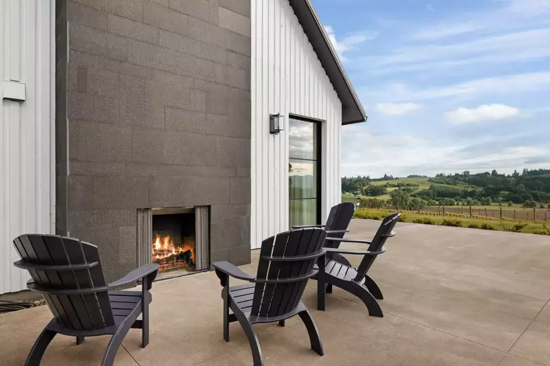 There is a fireplace outside in addition to the fireplaces inside.