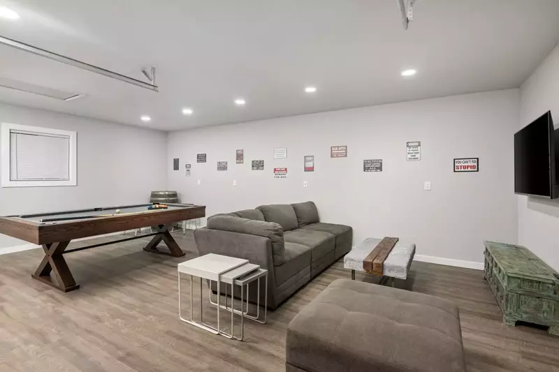 The game room is a fun place to hang out with friends and family. Enjoy a pool table, ping pong, a smart tv, and more.