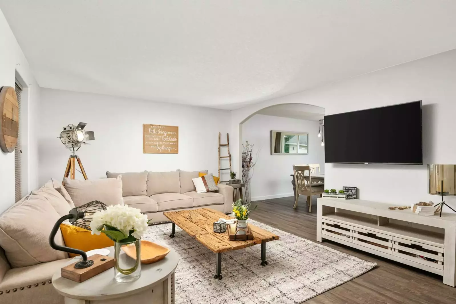 Watch you favorite movies, shows, and sports on this smart tv while relaxing in this cozy living room.