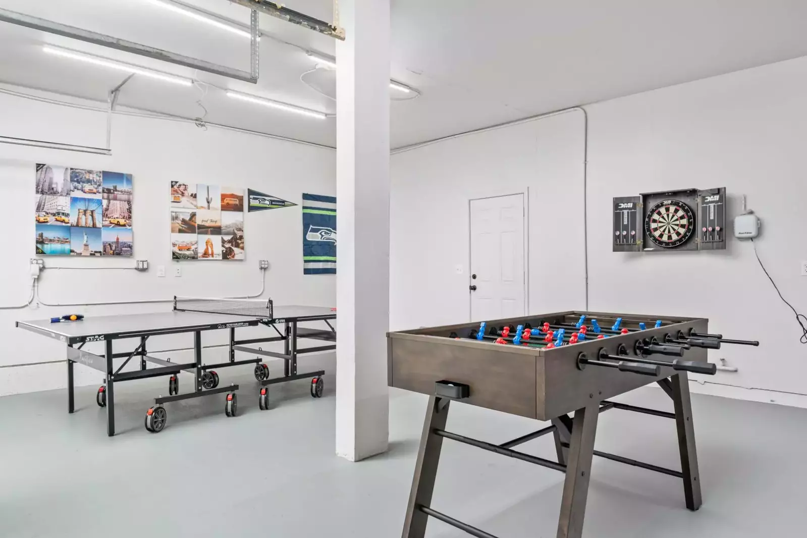 The game room is full of activities like ping pong, foosball, darts, and more!