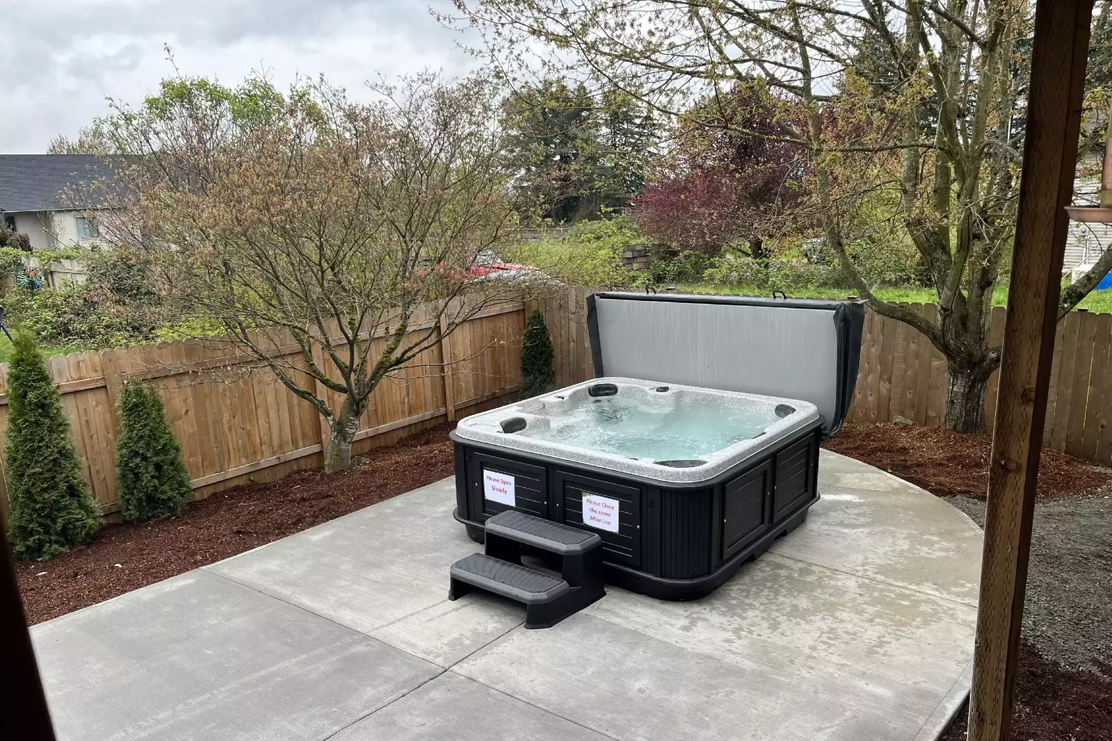 The hot tub is a favorite amenity perfect during warm summers and enchanting winters.