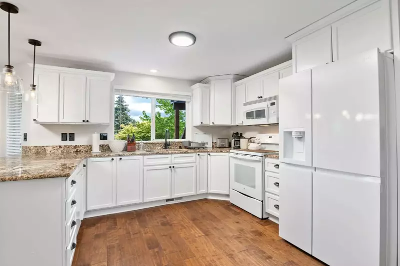 The kitchen has ample counter space and up to date appliances.