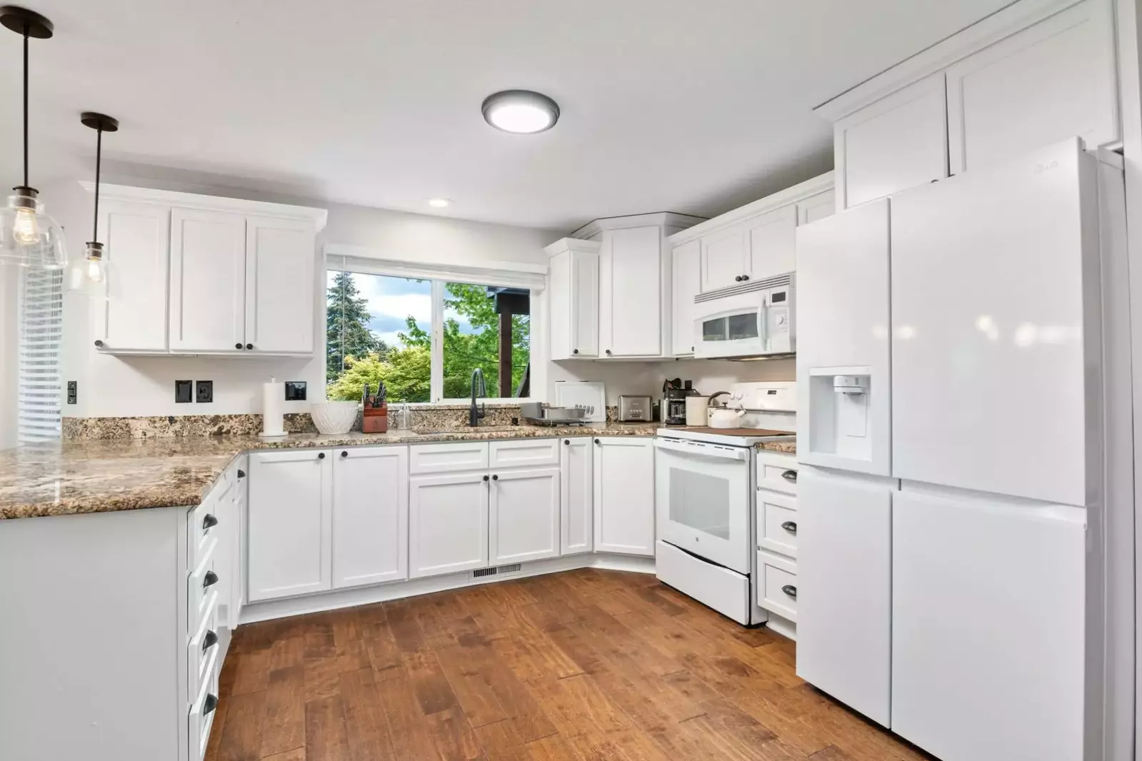 The kitchen has ample counter space and up to date appliances.