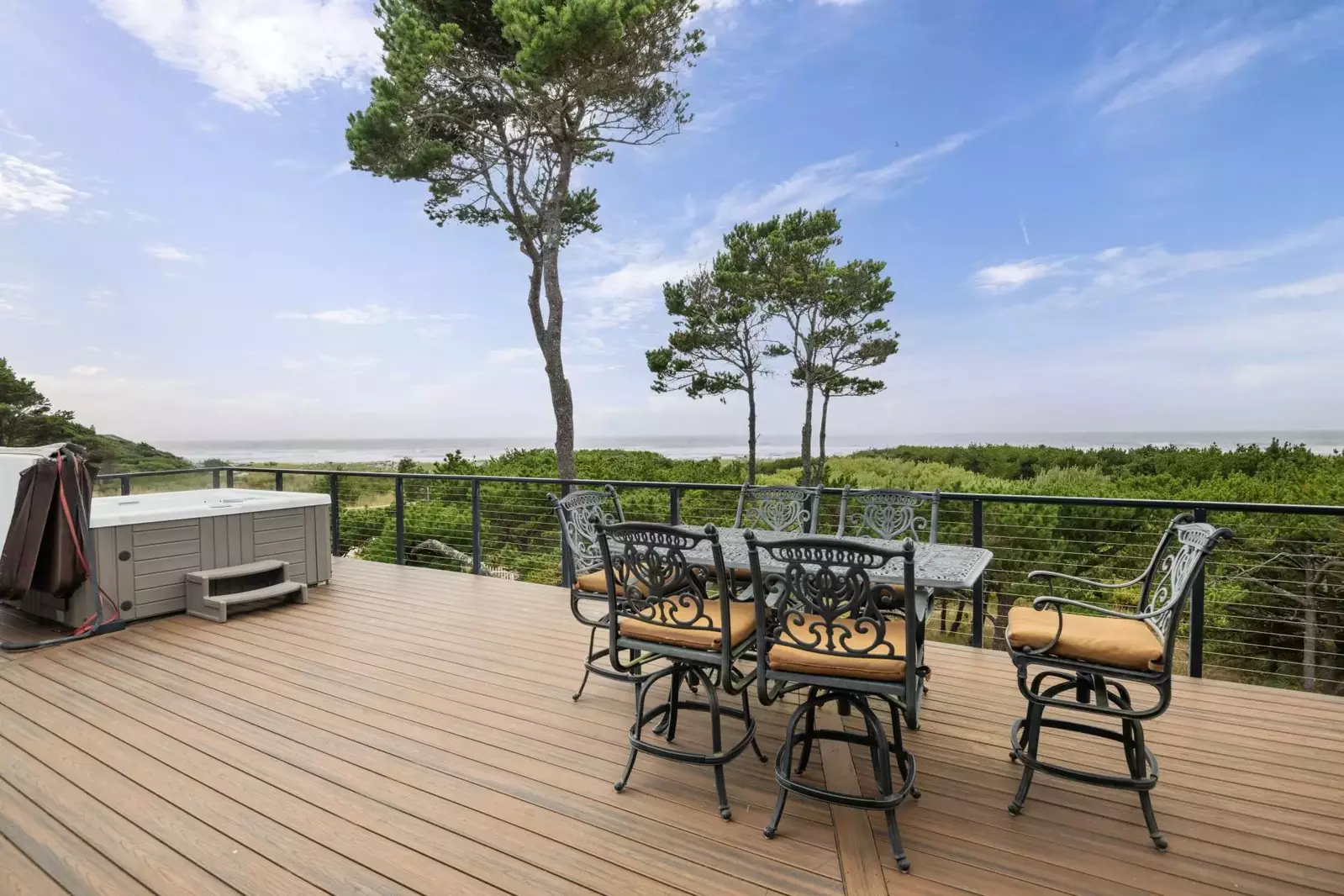 "The outdoor deck with hot tub and ocean facing windows is 10/10. Great location." - Bryce