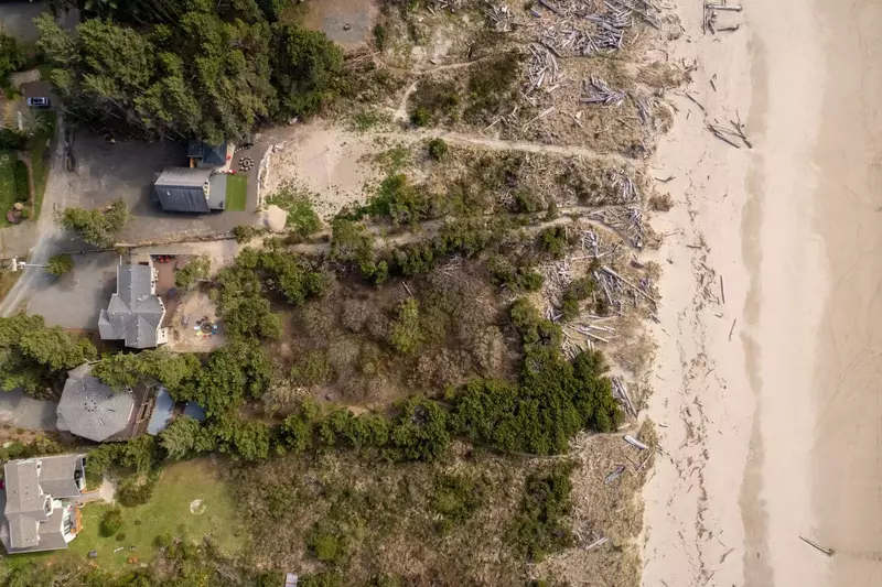 Private path from home to the beach. A Windbreak was built just for guests at the end of the path on the beach!
