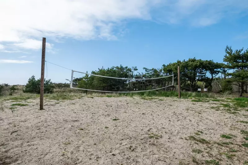 "Beautiful cabin right on the beach! Amazing backyard with hot tub, firepit, bar area, outdoor shower and volleyball court." - Allison