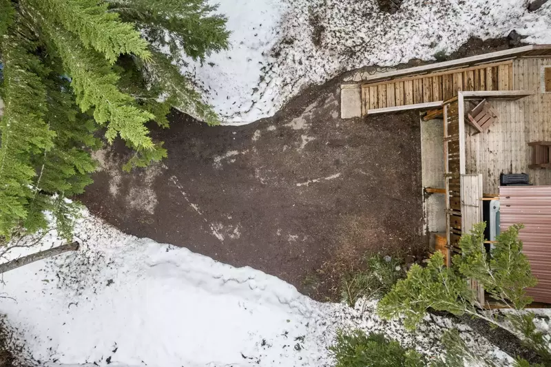 The driveway and road are plowed during winter.