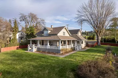 The property has a spacious yard perfect for having a picnic.