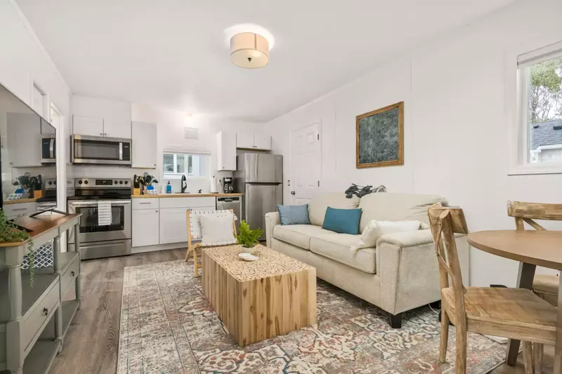 A full kitchen and comfy living room are part of this rental.