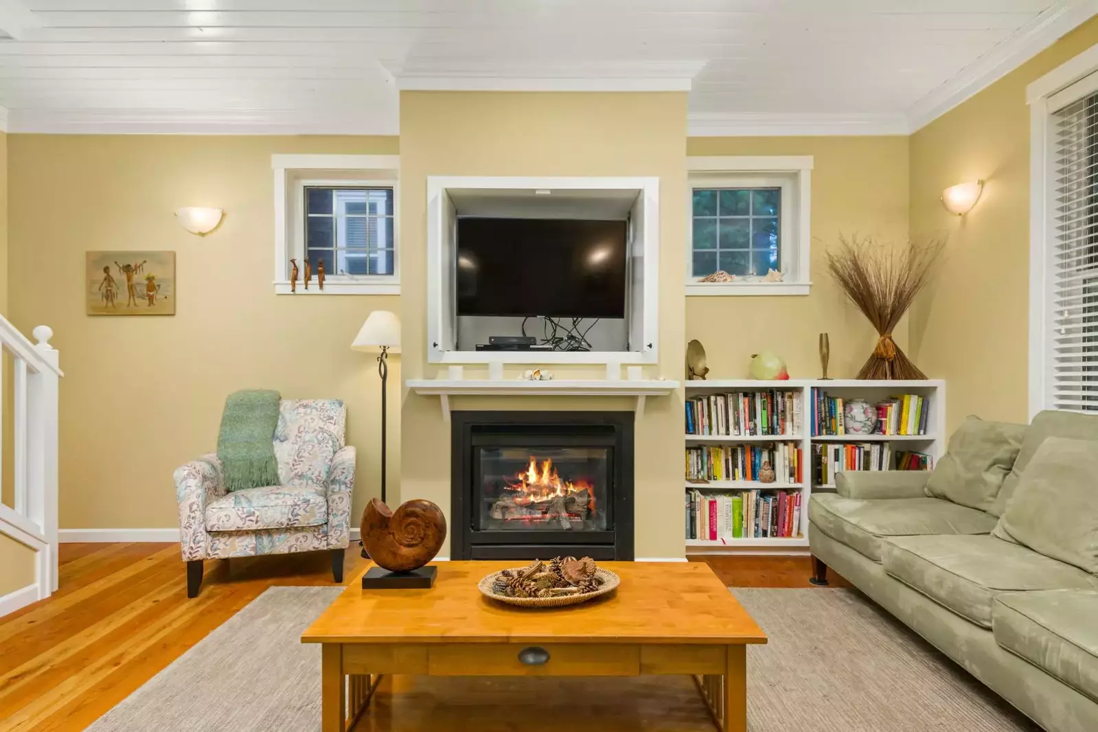 Watch you favorite movies, shows, and sports on this smart tv while relaxing in front of a cozy fire.