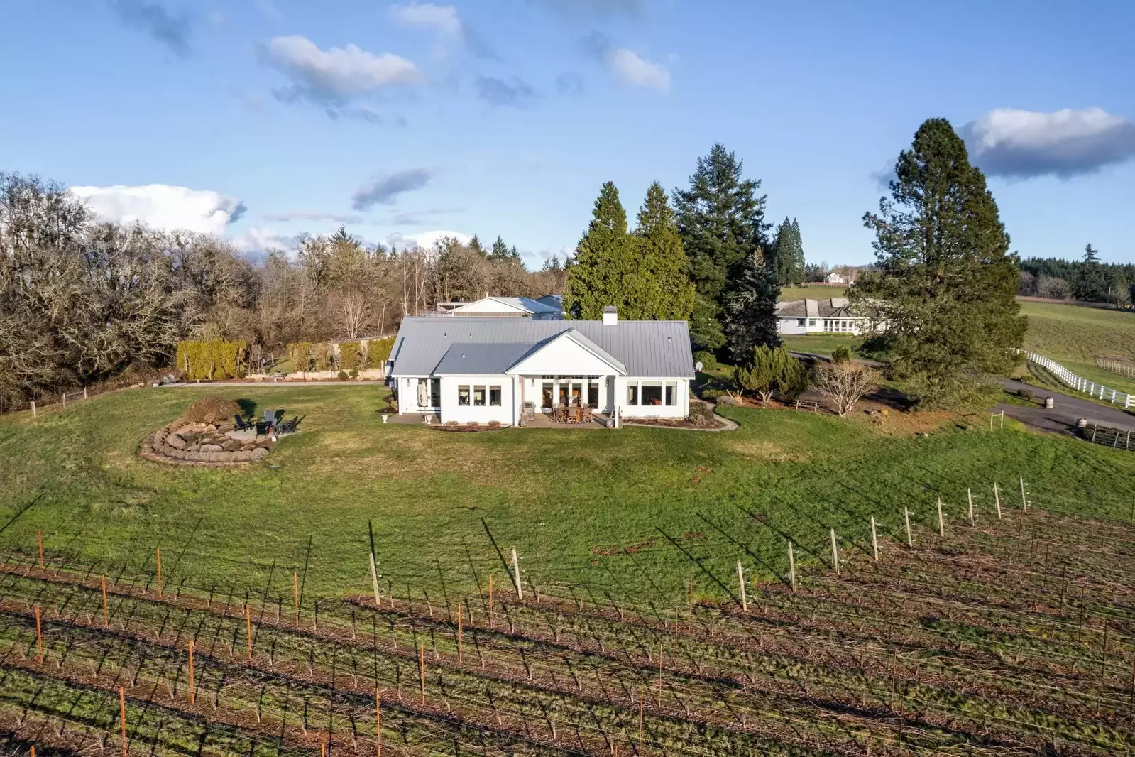 Beautiful grounds overlooking their vineyard. Well located for winery touring.  -Grant