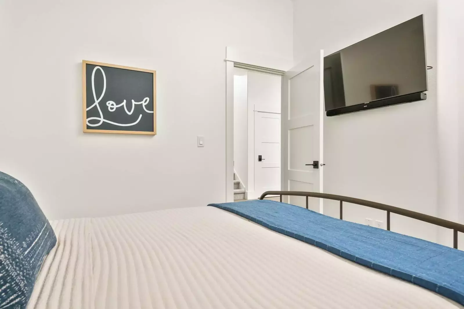 Enjoy unwinding after a day exploring the Oregon Coast by watching a movie in this comfy bed.