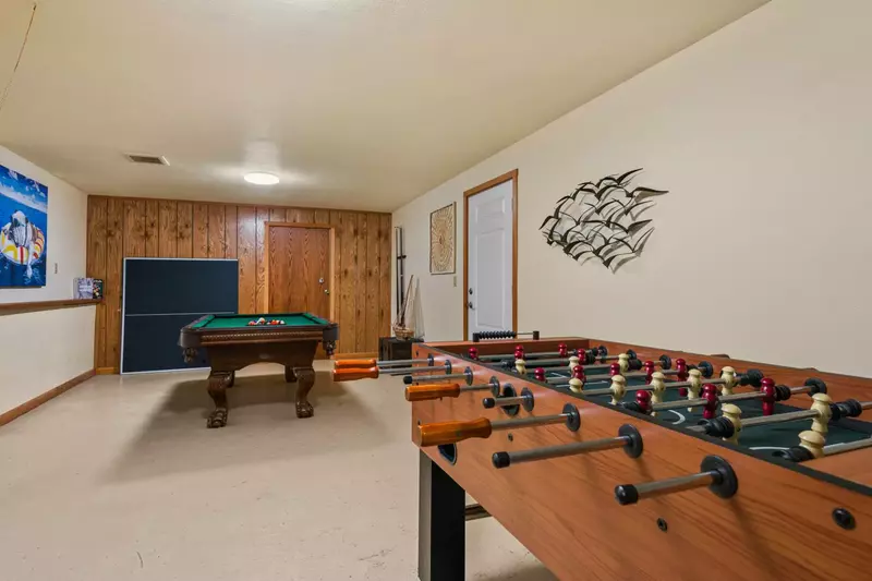 Play pool, foosball, other games, and then relax in the hot tub in the game room!