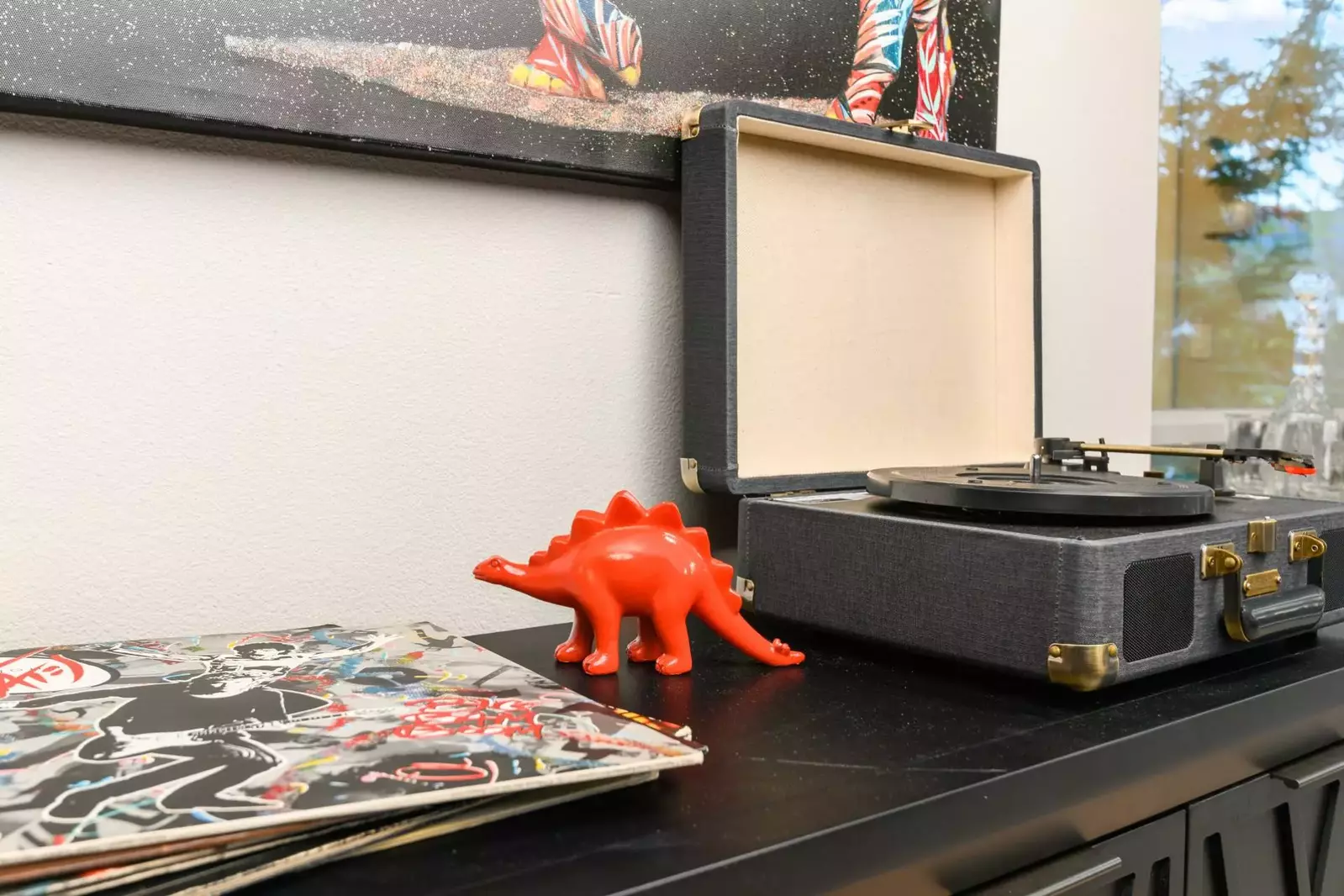 Chill out with some nice tunes courtesy of the Woodstock Townhouse record player.