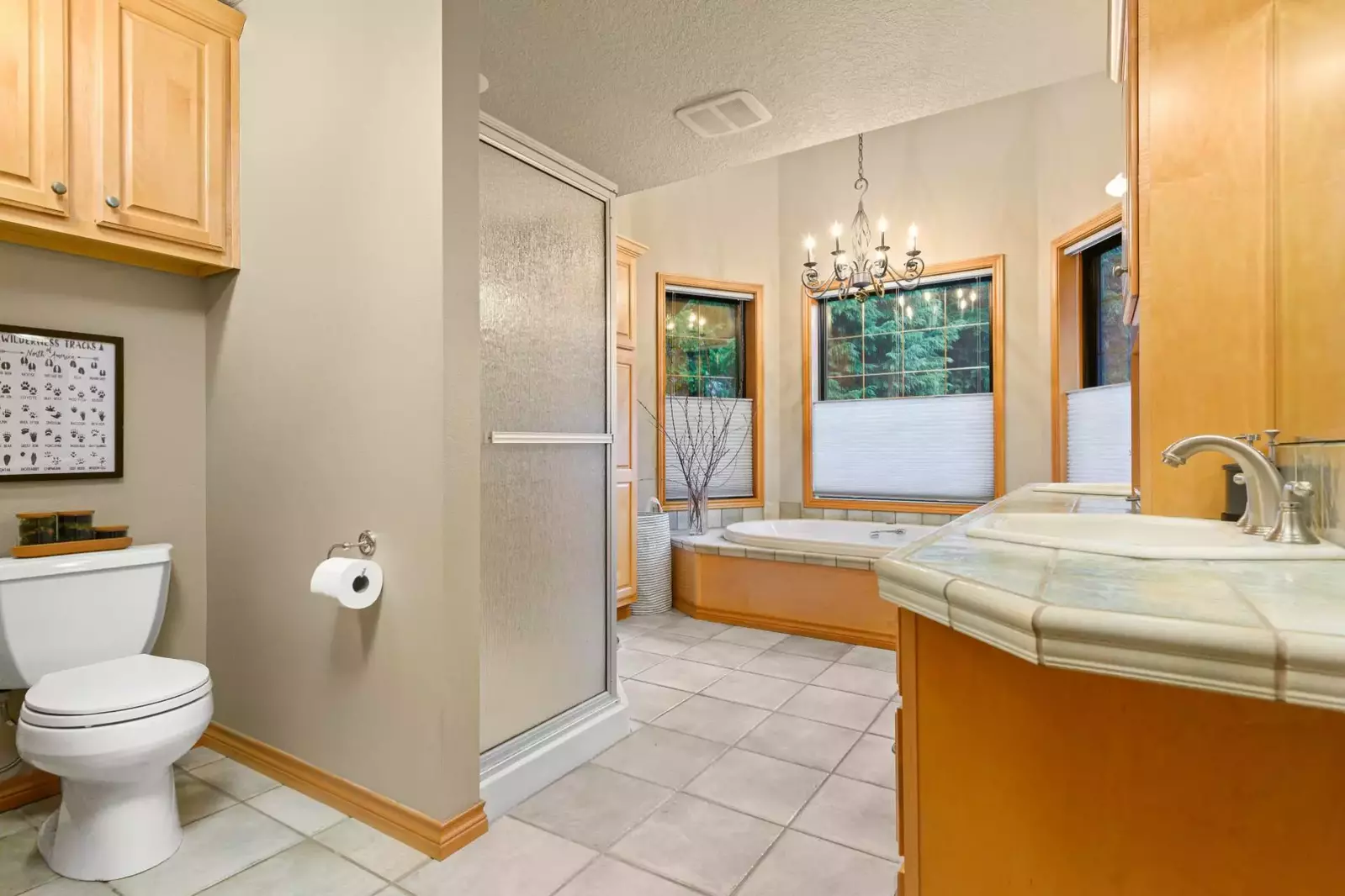 This bathroom is incredibly spacious and luxurious.