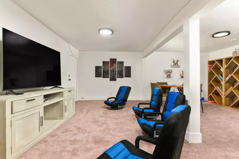 Enjoy incredibly comfy chairs in the home theater area.