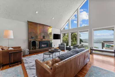 Relax in the living room in front of a cozy fire, while watching your favorite shows, movies, and sports!