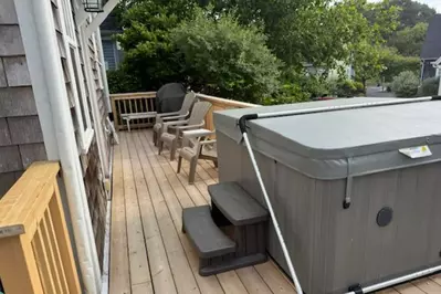 The hot tub is a favorite amenity perfect during warm summers and enchanting winters.