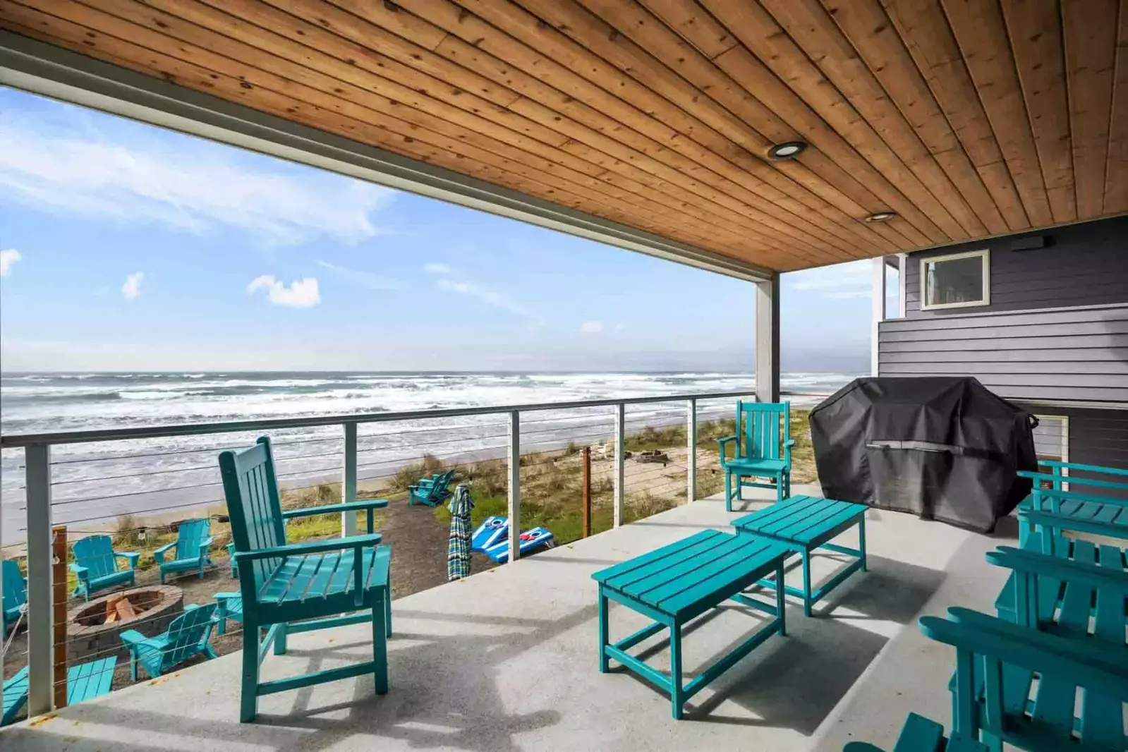 The covered deck is a great place to get some ocean air all year long.