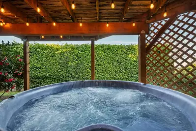 The hot tub is a favorite amenity perfect during warm summers and chilly winters.