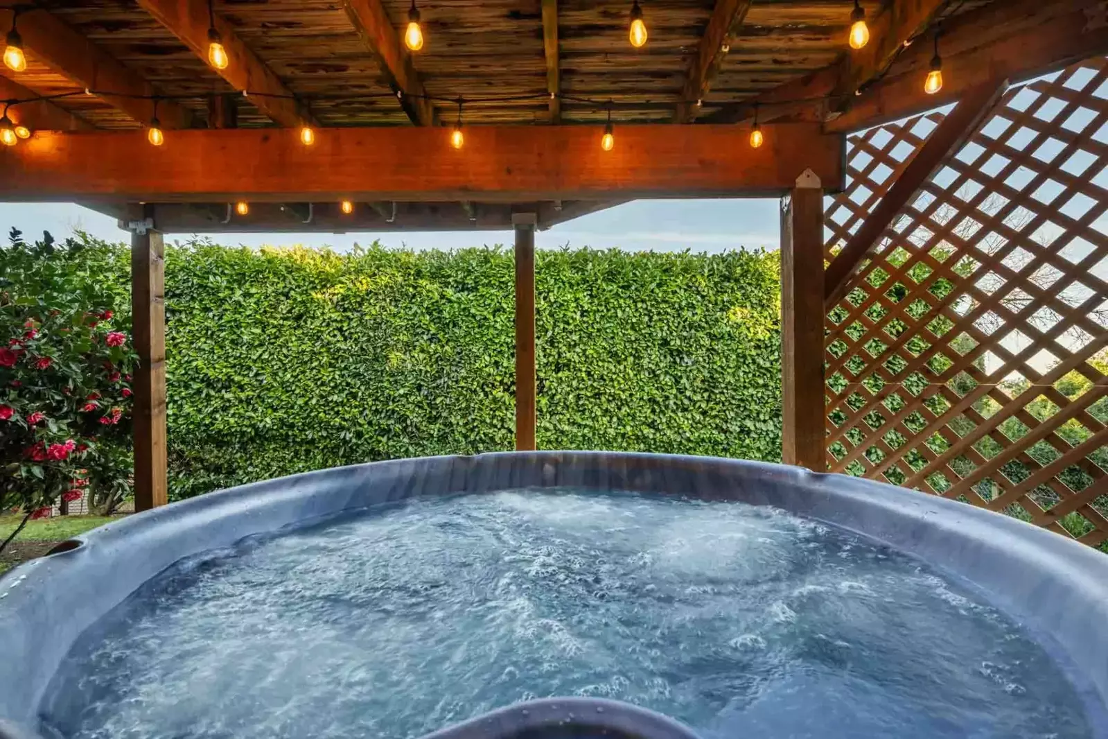 The hot tub is a favorite amenity perfect during warm summers and chilly winters.
