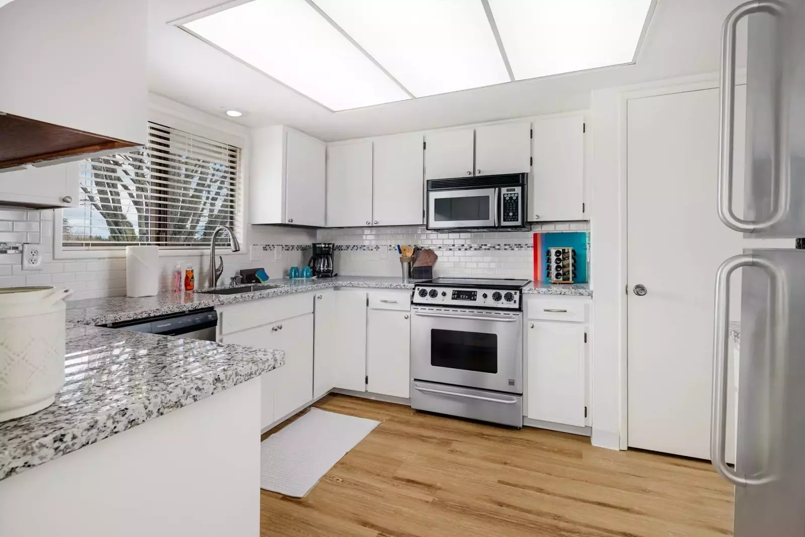 Your bright and beautiful fully stocked kitchen.