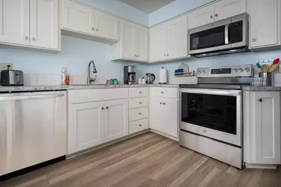 The place well equipped, comfortable couch, cozy kitchen.  -Ingrid