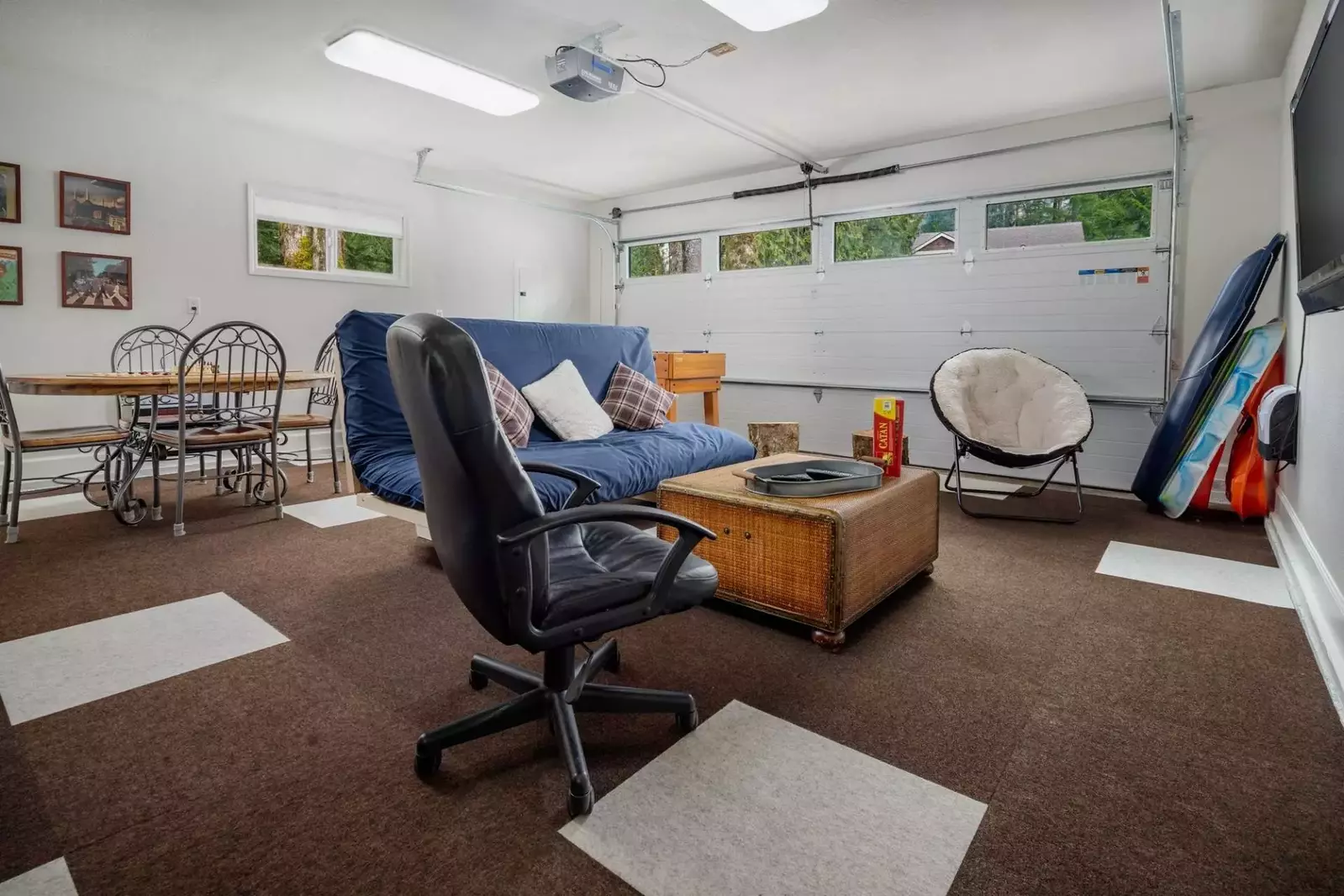 This garage has been converted to an incredible game room for play and streaming.