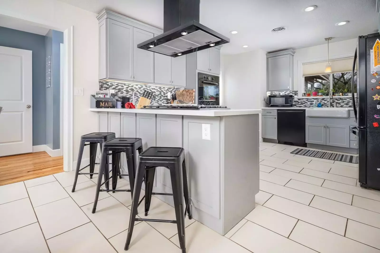 Large suburban house in quiet area with an open kitchen/dining/family area perfect for eating and lounging.  -Luann