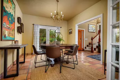 This dining area can sit about 6 people comfortably and the sliding doors make it possible to listen to the sounds of nature while enjoying your meals