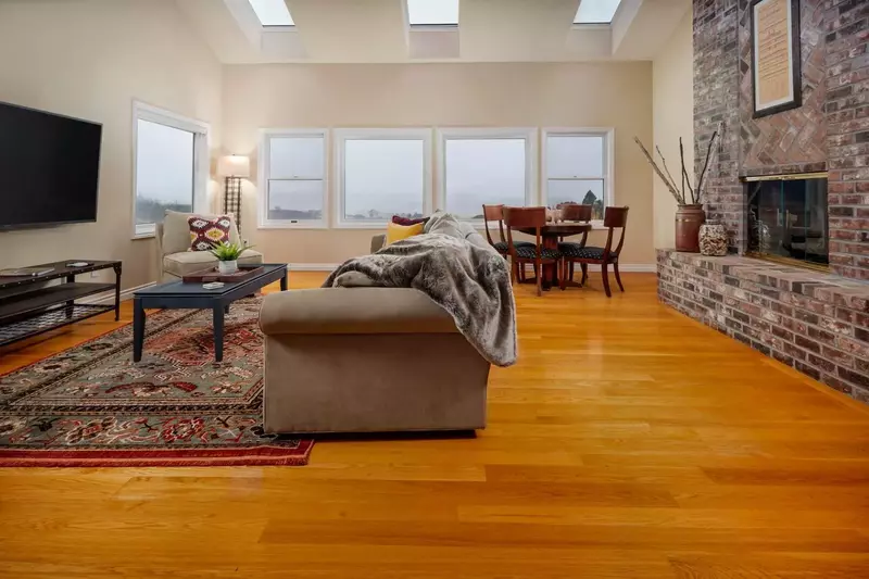 The house is warm and welcoming, with a sophisticated yet cozy and inviting decor.  -Gwen