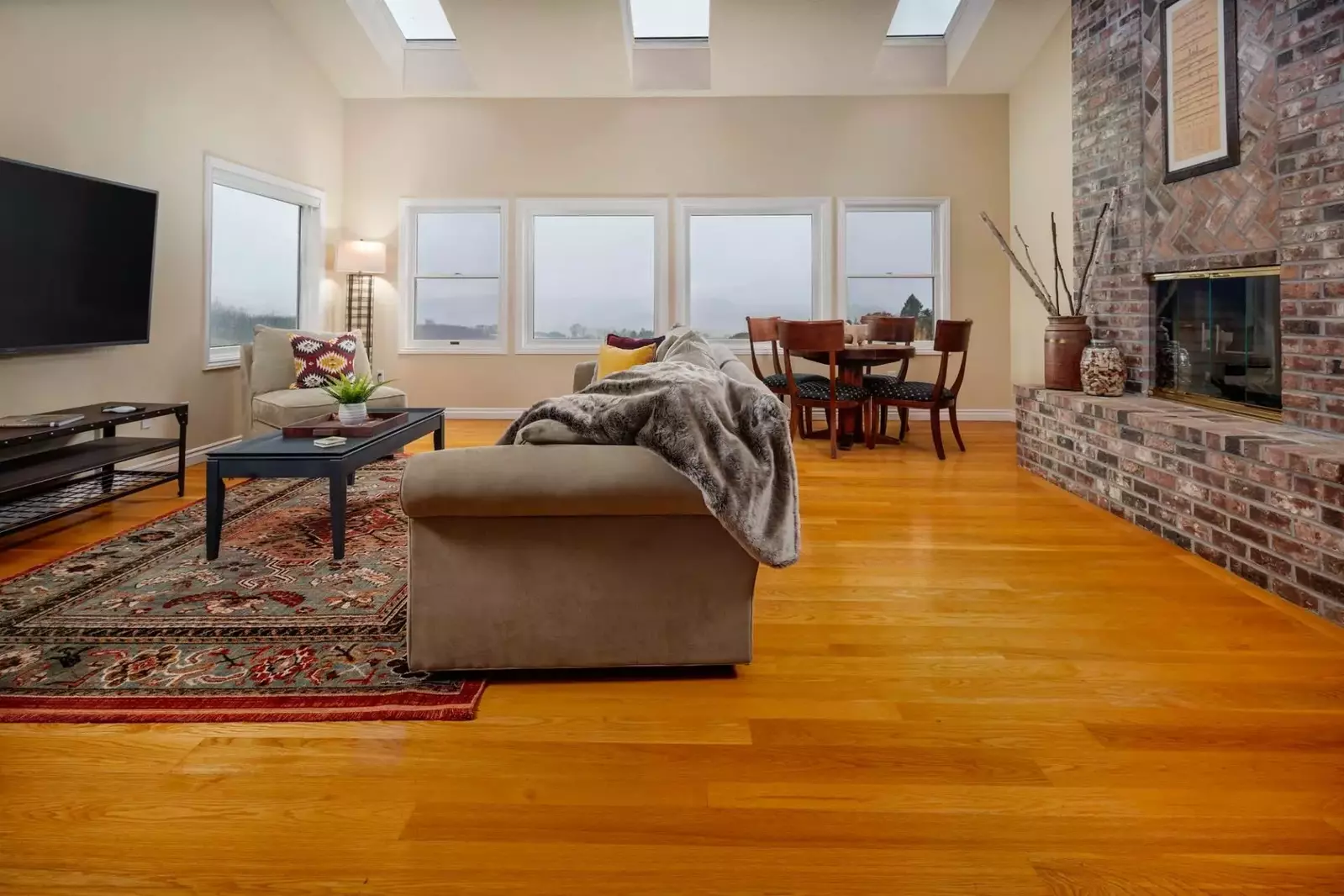 The house is warm and welcoming, with a sophisticated yet cozy and inviting decor.  -Gwen