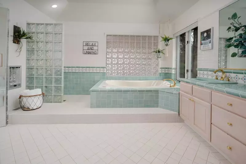 The huge primary bathroom includes a great soaking tub for ultimate relaxation.