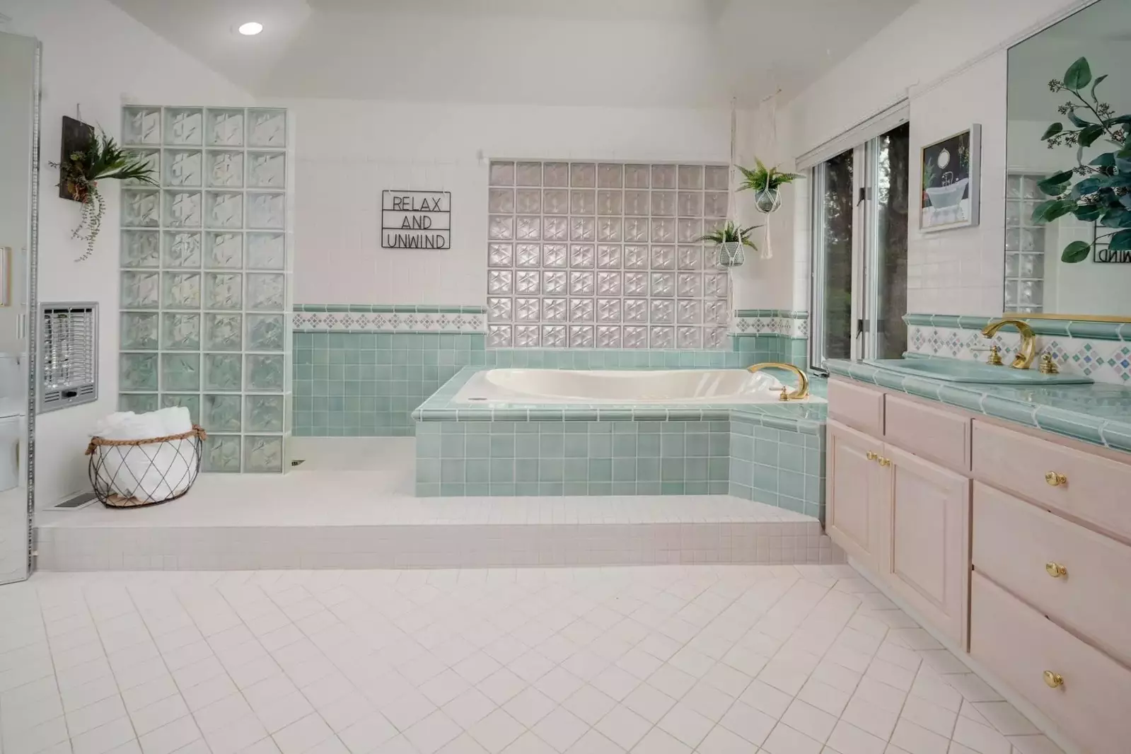 The huge primary bathroom includes a great soaking tub for ultimate relaxation.