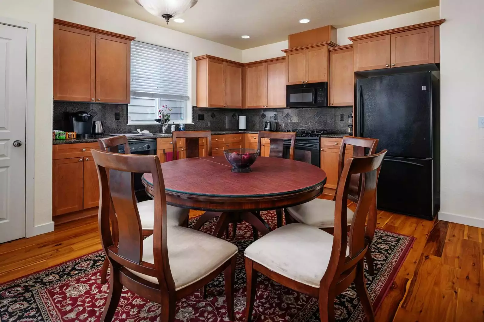 Dining table expands to seat up to 10. The cover also reverses for a green felt surface for games.