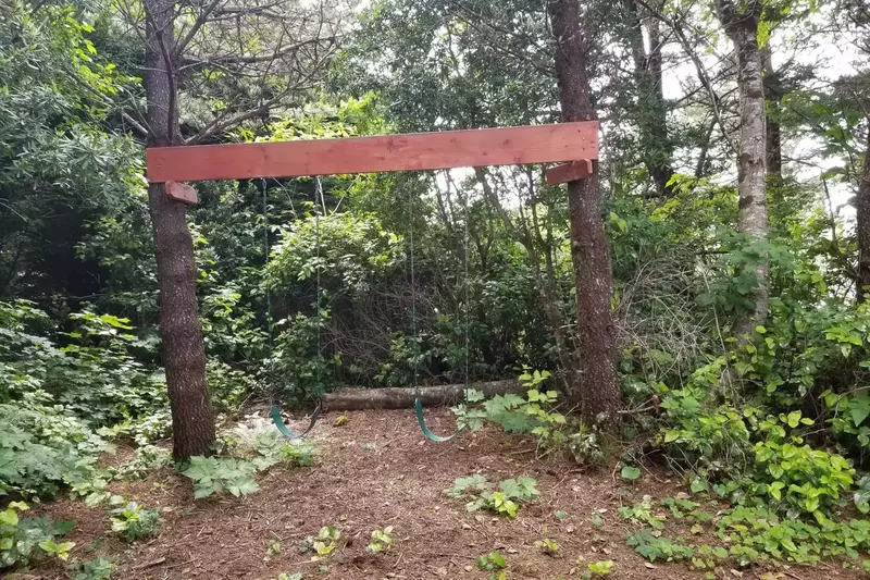 "Our kids (2 and 4 years old) loved the backyard with the pond, swing, climbing trees and little path." - Tanya