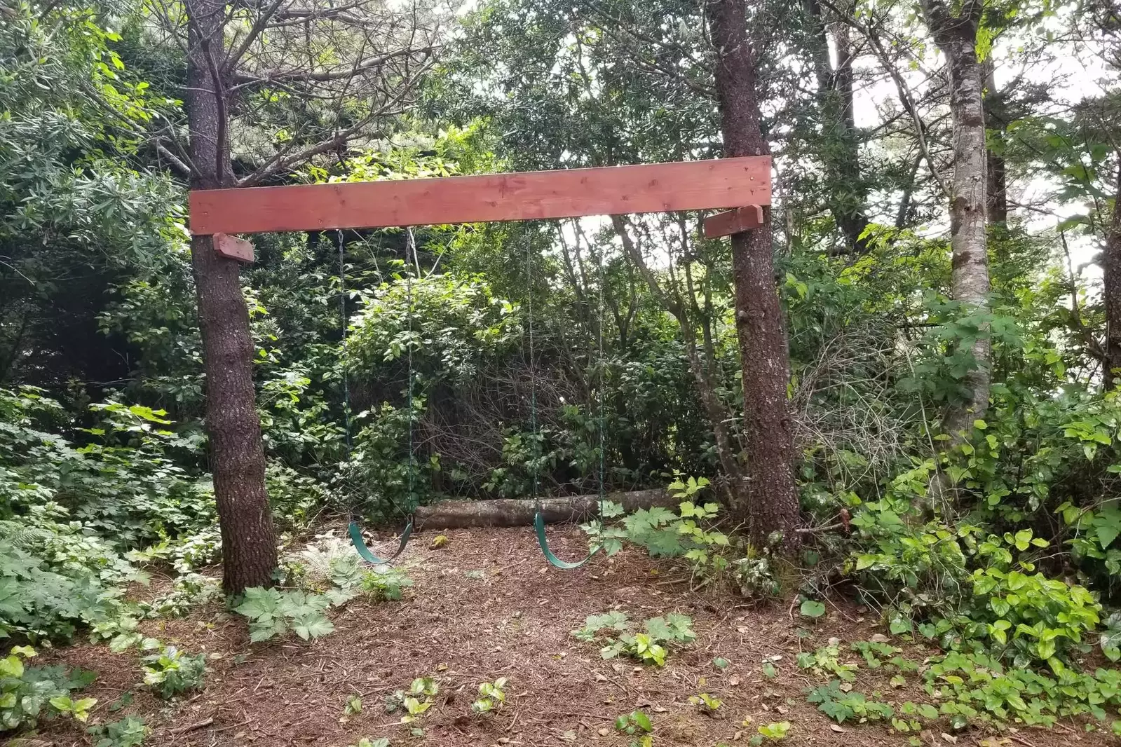 "Our kids (2 and 4 years old) loved the backyard with the pond, swing, climbing trees and little path." - Tanya