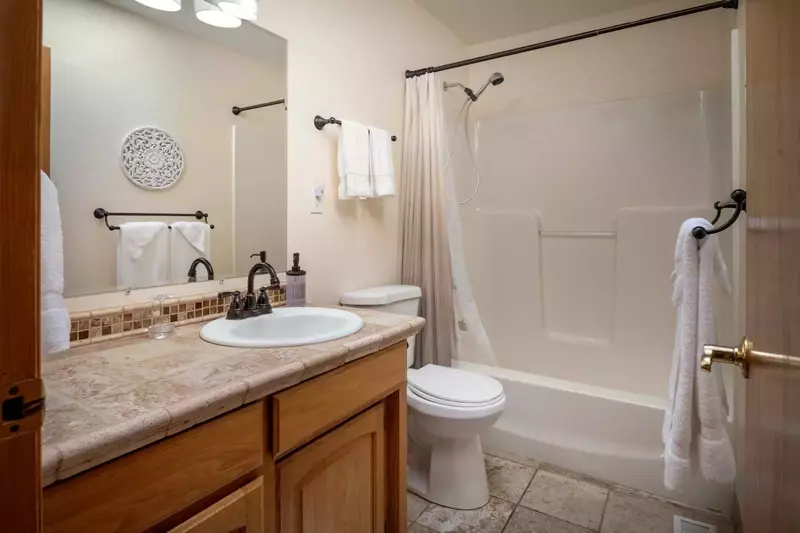 One of three full bathrooms on the property.