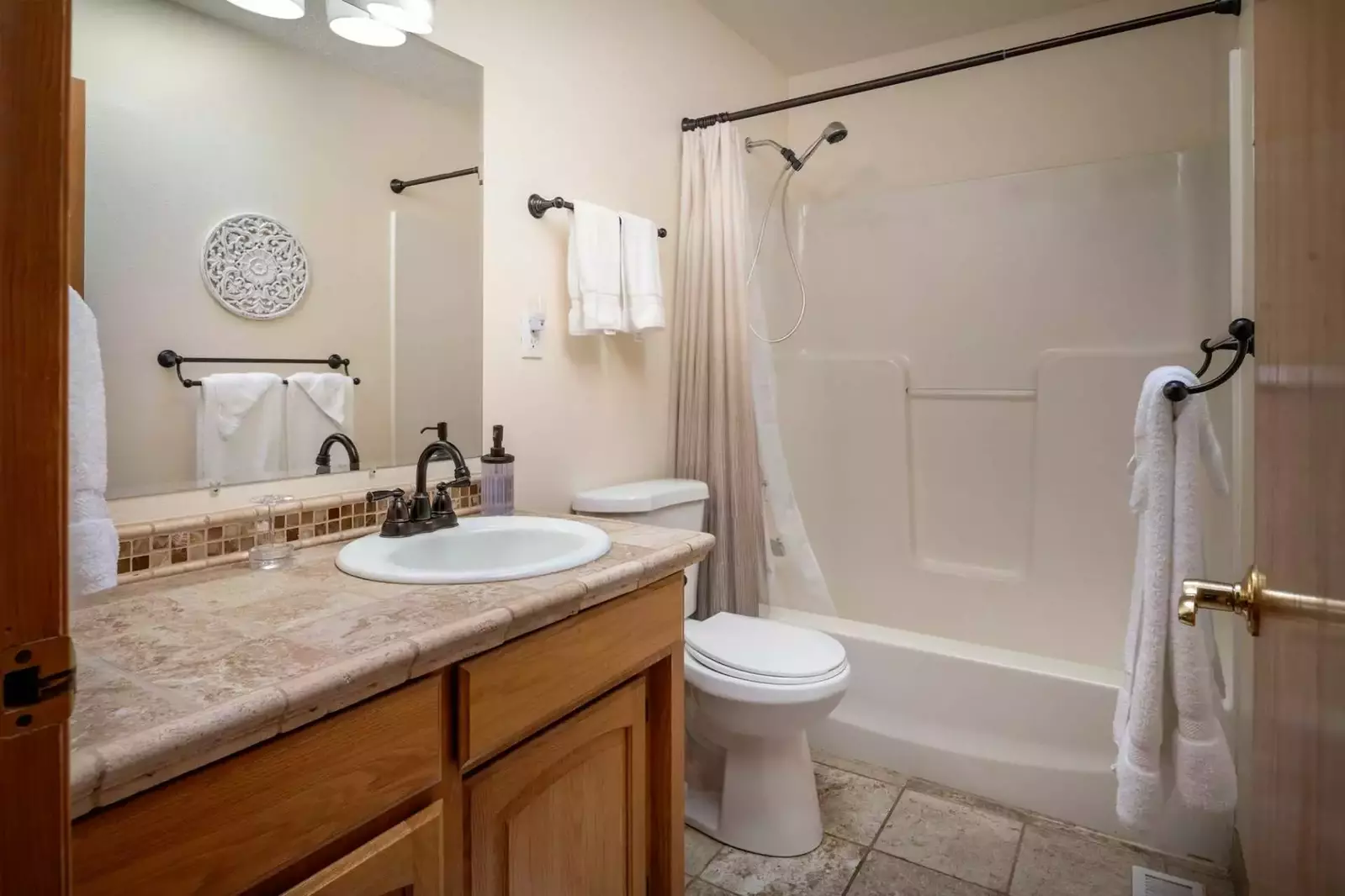 One of three full bathrooms on the property.