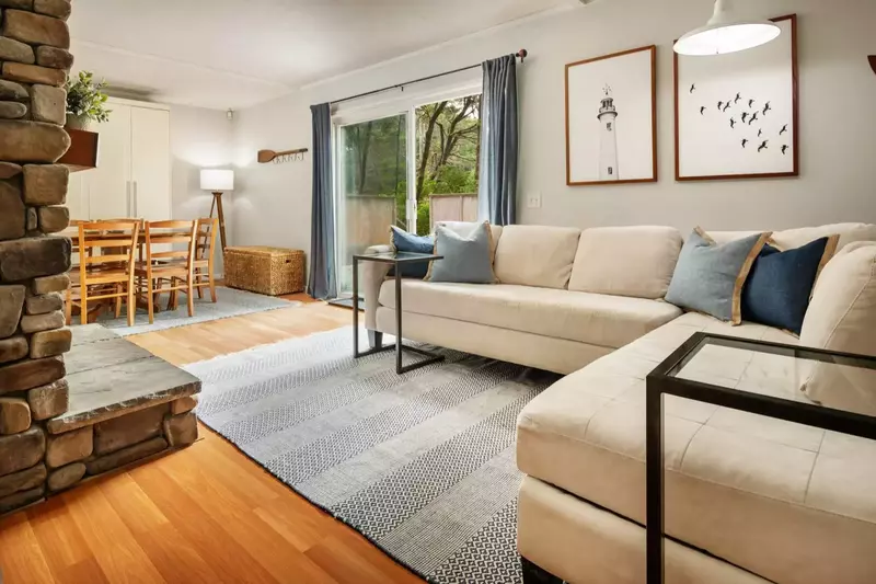 Saltwater Cottage living and dining area also opens up the front deck area