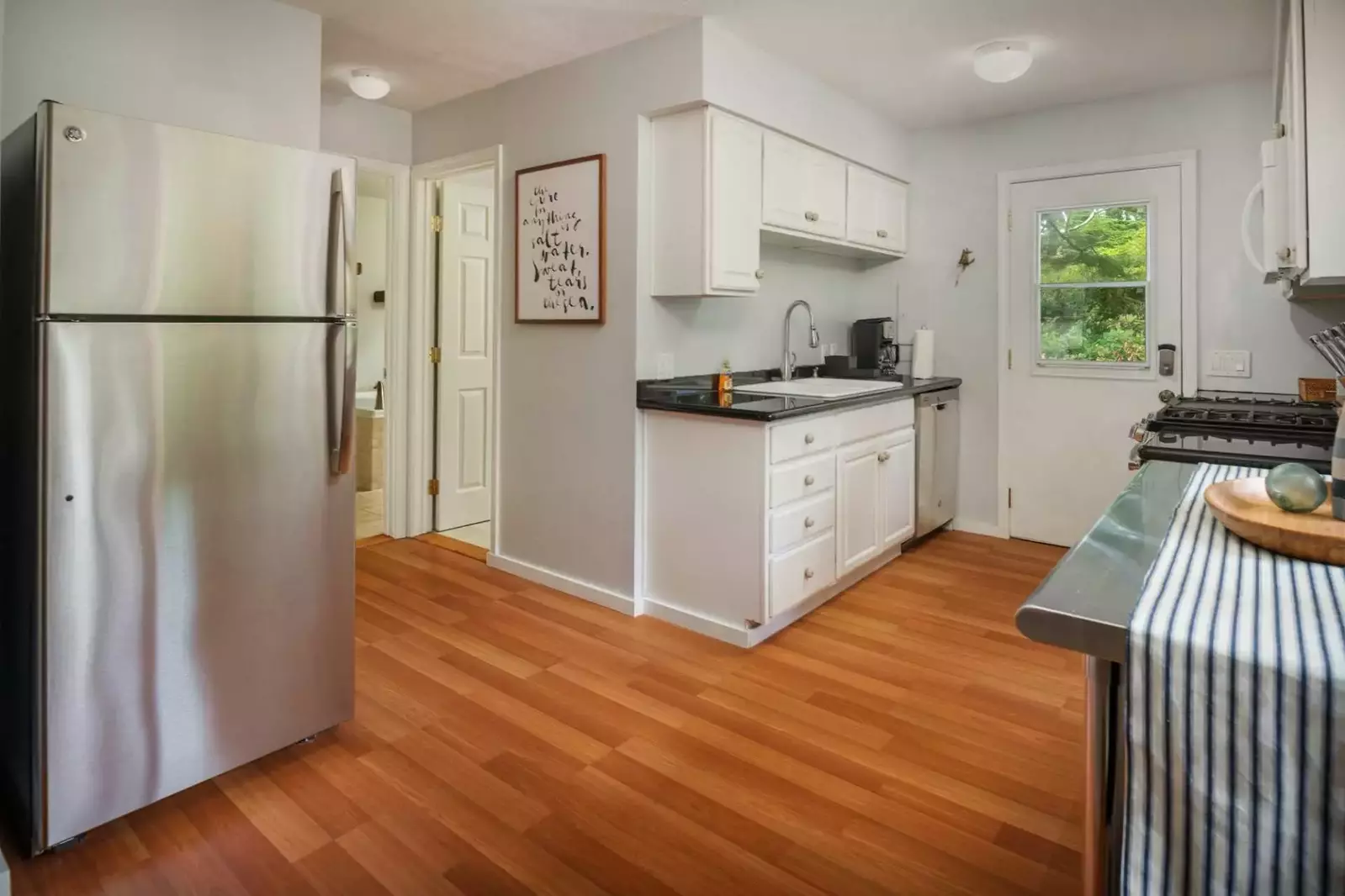 Main level bathrooms near kitchen and dining