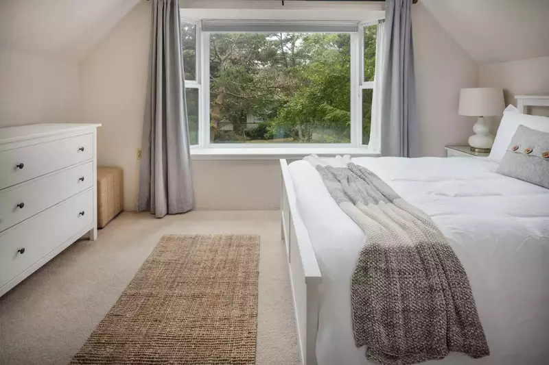 Master bedroom with large bay window
