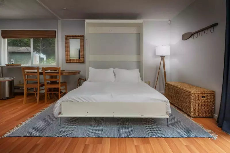 Murphy bed on main level folds out if needed to sleep more