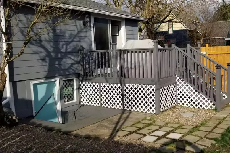 The deck provides a small amount of seating space, with additional space just a short walk downstairs.