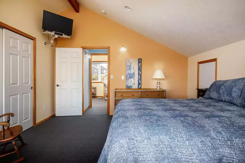 The master bedroom is spacious, bright, and comfortable