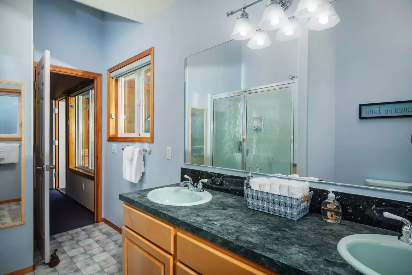 Primary bath has ample room with dual sinks.