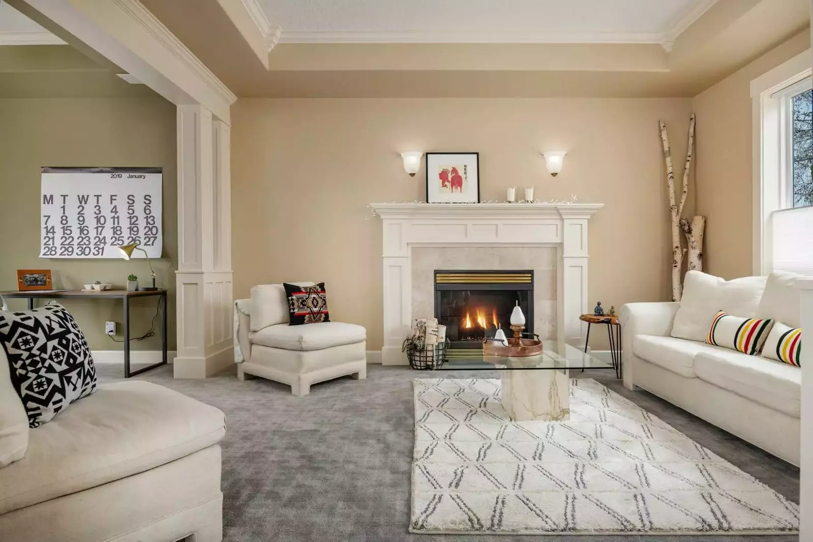 Casual seating by the fire and a desk for any work you may need to do during your stay.