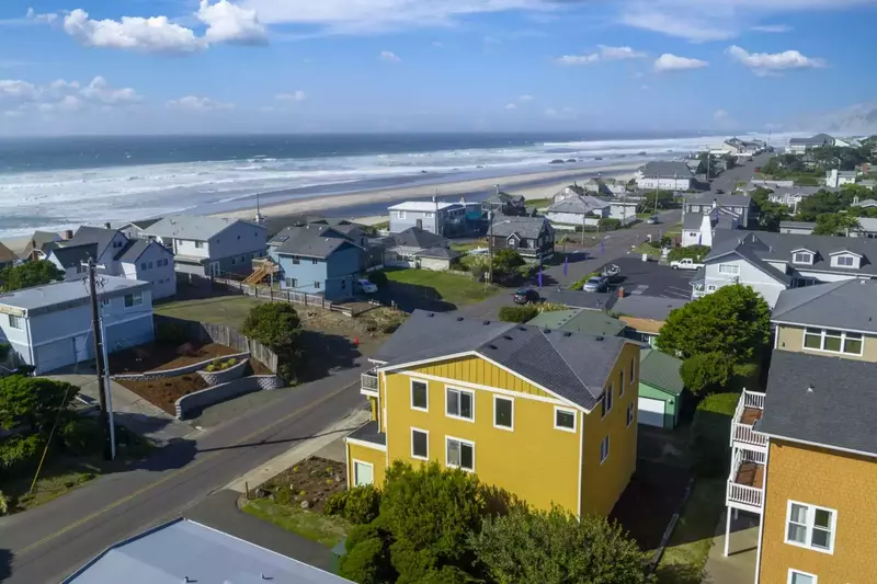 Welcome to Pacifica, the expansive yellow home in the center of the picture.