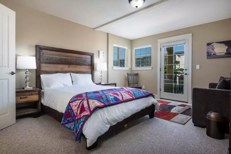 Spacious and beautifully appointed bedroom with sleeper sofa as well.