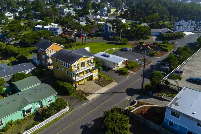Pacific from the road. Two parking spots in the garage, two parking spots on the driveway.